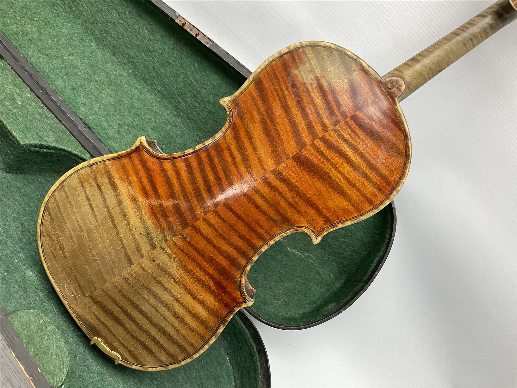 Late 19th century German violin with 36cm two-piece maple back and ribs and spruce top; bears label for 'Thomas Jacklin Violin Maker & Repairer Hull 1879'; 60cm overall; in ebonised wooden coffin case.