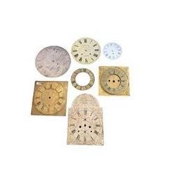 Six clock dials and an engraved brass chapter ring.
Comprising of four 18th century brass longcase dials with two painted wall clock dials and an 18th century engraved single-handed brass chapter ring.