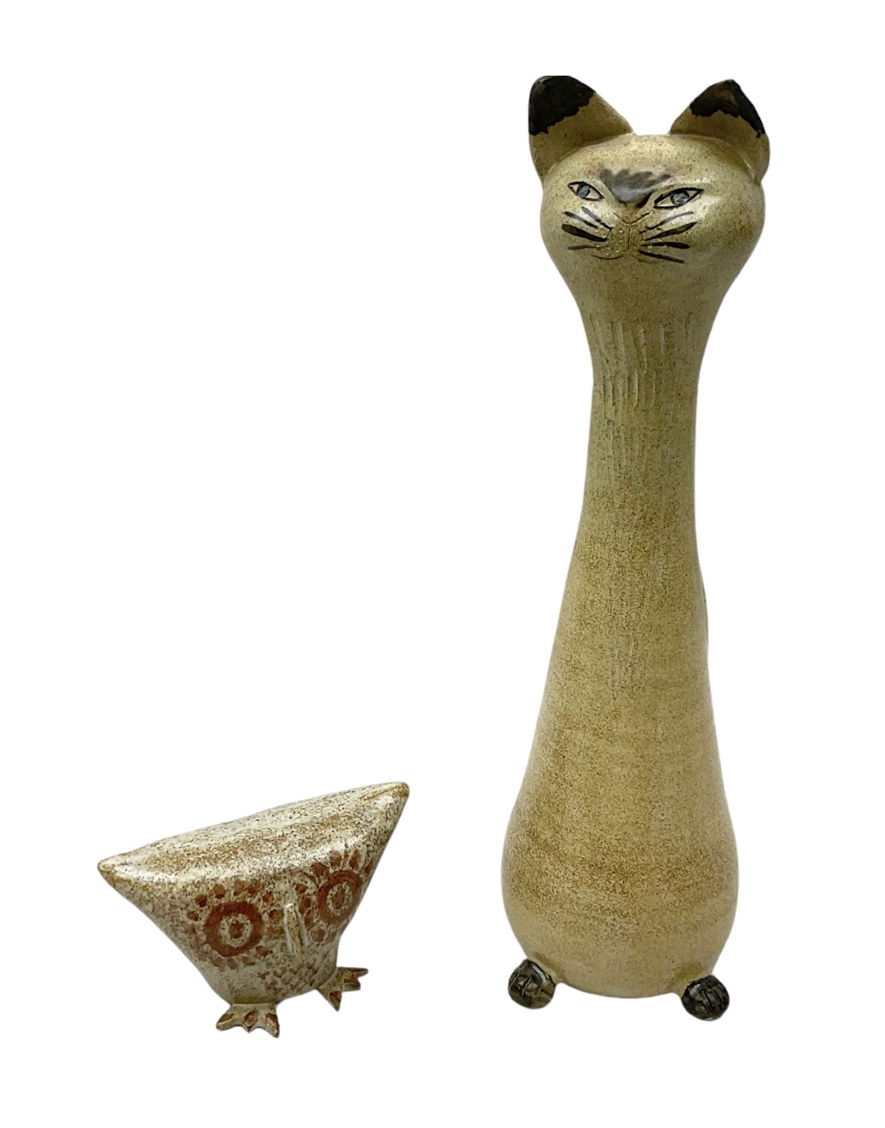 Studio pottery figure of an owl with indistinct mark beneath, together with a pottery figure of a cat of tall slender form, H34cm