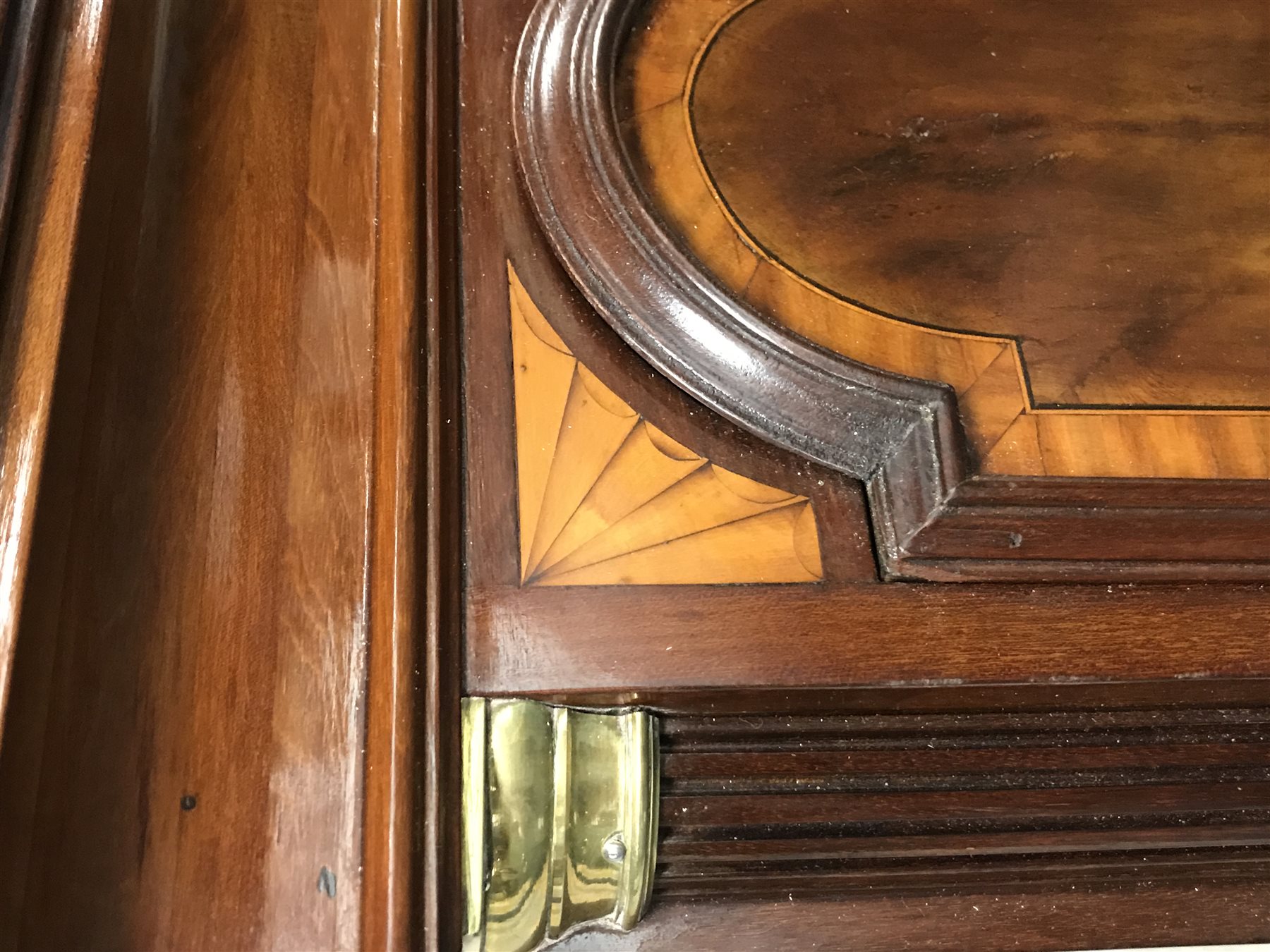 Early 19th century inlaid and cross banded mahogany London style longcase clock, brass arched dial, Roman and Arabic numerals, second and month subsidiary, lattice spandrel, eight day movement, automatic night time silent and strike mode, H242cm (two weights and pendulum)