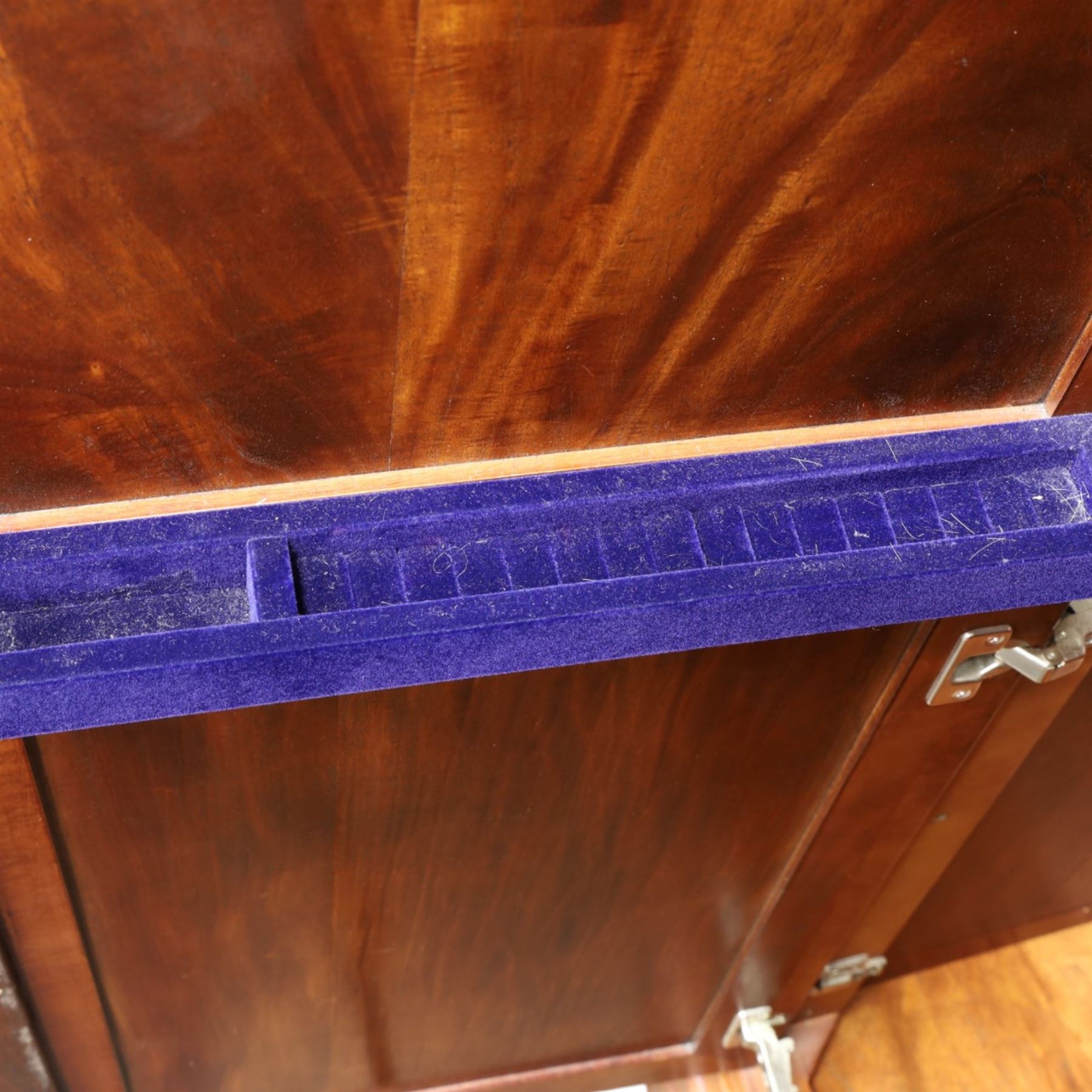 Willis & Gambier - mahogany bedroom wardrobe, projecting cornice with two additional rails, panelled doors with trouser rack and blue baize trinket, enclosing a shelf above a wooden clothes rail and shoe rack, raised on bracket feet 