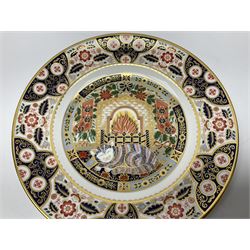 Limited edition Royal Crown Derby Christmas plate, depicting a cat sleeping by a fire, the third plate in an original series of four, no 584/1750, boxed