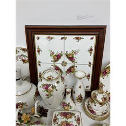 Royal Albert Old Country Roses pattern ceramics, to include table lamp, lidded vase, two pairs of salt and pepper shakers, cups and saucers, plates, biscuit jar, bowls, lidded preserve pot, vases, dishes, knives, napkin rings, lidded jars and box, pair of candlesticks etc
