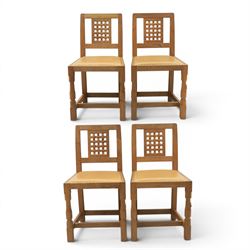 Mouseman - set of four oak lattice back chairs with tan seat with brass studded trim, with...