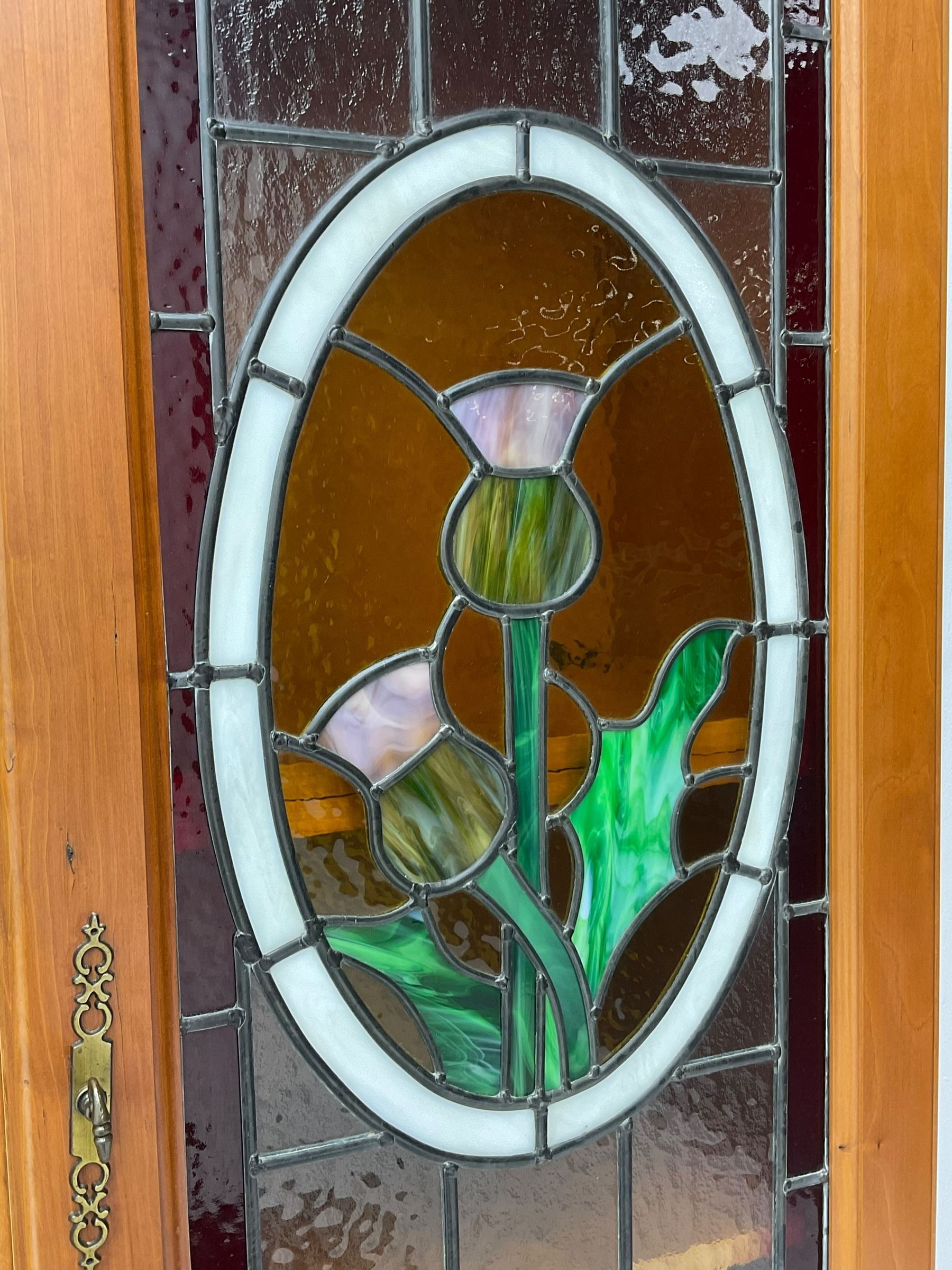 Art Nouveau design cherry wood kitchen wall unit, two leaded glazed doors with stained tulip decoration