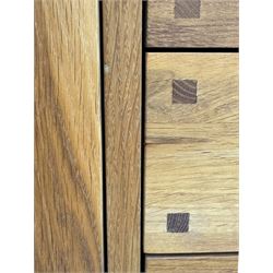 Laura Ashley - 'Milton' light oak sideboard, fitted with four central drawers flanked by two panelled cupboards, on square supports