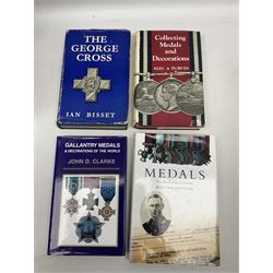 Eleven medal reference books including Ian Bisset: The George Cross; Spinks British Battles & Medals; William Spencer: Medals - The Researchers Guide; John D. Clarke: Gallantry Medals & Decorations of the World; Officers of The Green Howards 1931-1972; and six others (11)