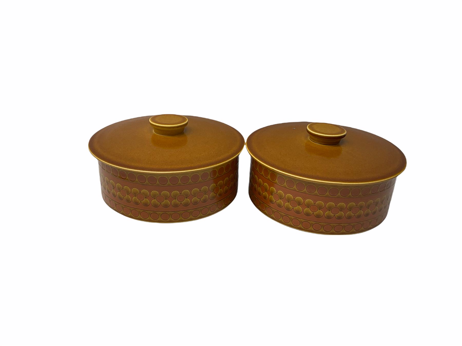 Hornsea Pottery Saffron pattern dinner and tea ware, comprising two lidded vegetable dishes, oval platter, nine dinner plates, six side plates, seven tea plates, covered tea caddy, covered coffee caddy, coffee pot, large jug, small jug, eight cups and seven saucers (45).  