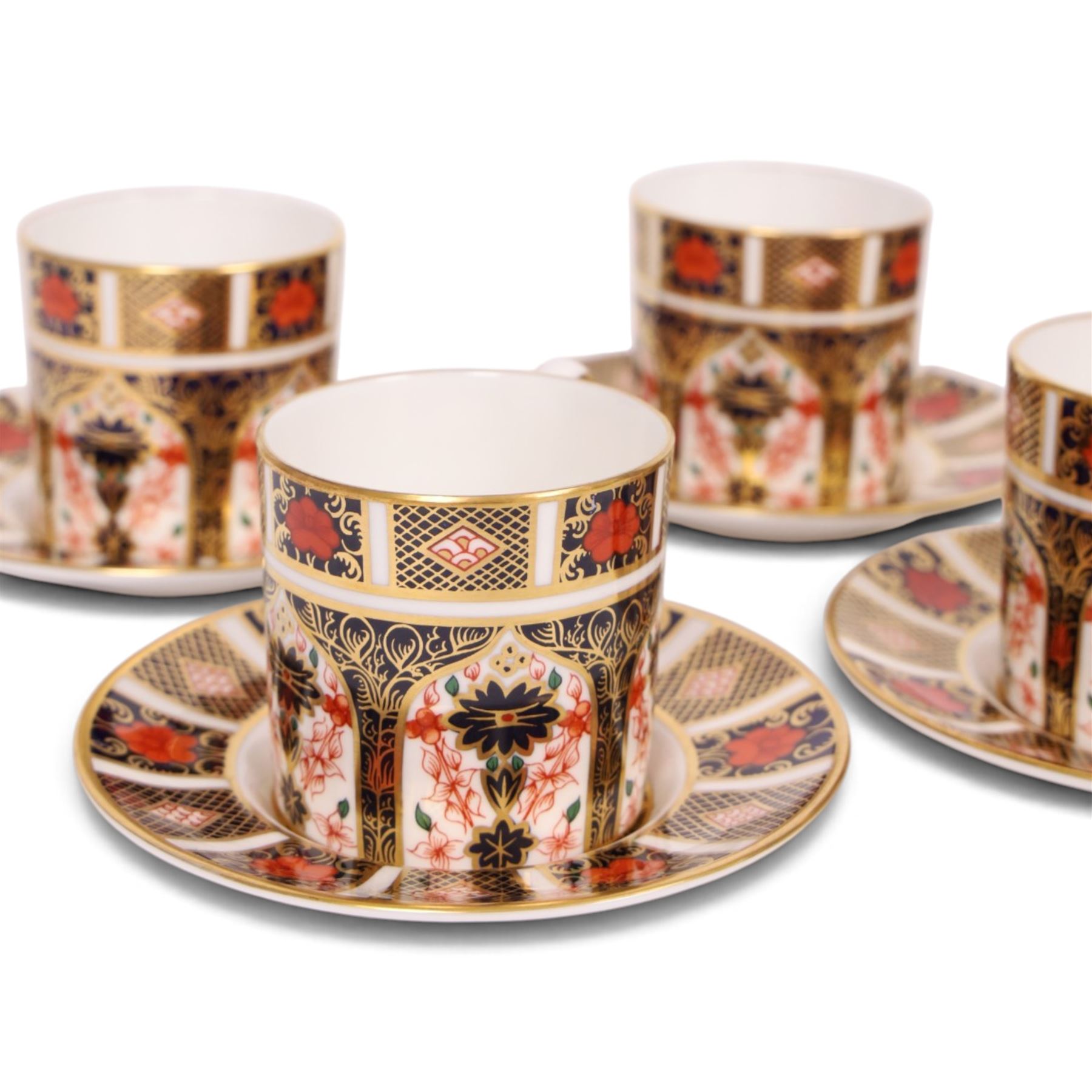 Eight Royal Crown Derby Old Imari 1128 pattern coffee cans and saucers