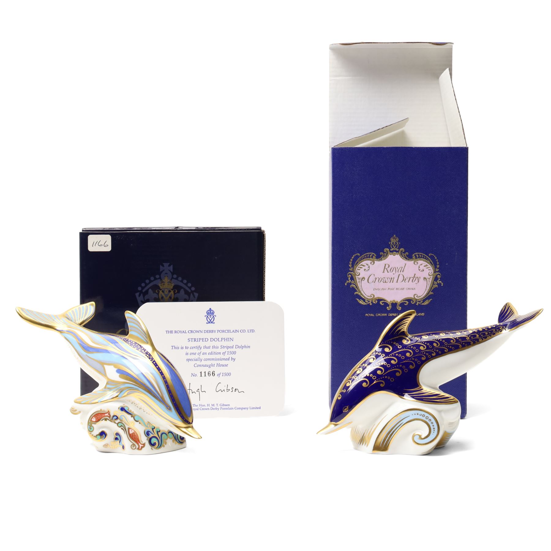 Moorcroft 'Wind of Change' pattern vase H13cm, boxed, Royal Crown Derby 'Striped Dolphin' limited edition paperweight 1166/1500, boxed and with certificate and another Dolphin paperweight, boxed and both with gold stoppers (3)  