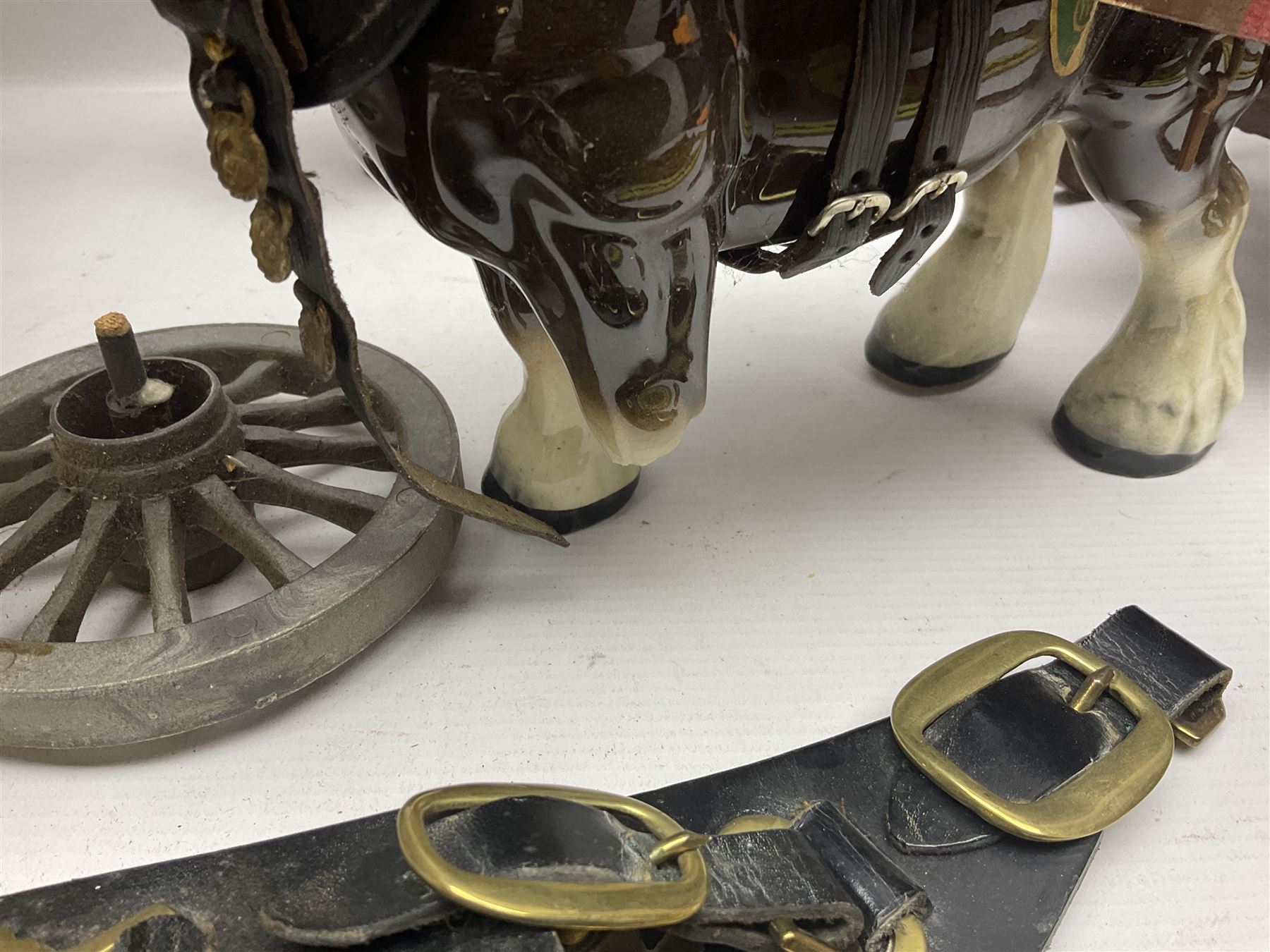 Two ceramic shire horse and gypsy caravans, together with horse brasses 