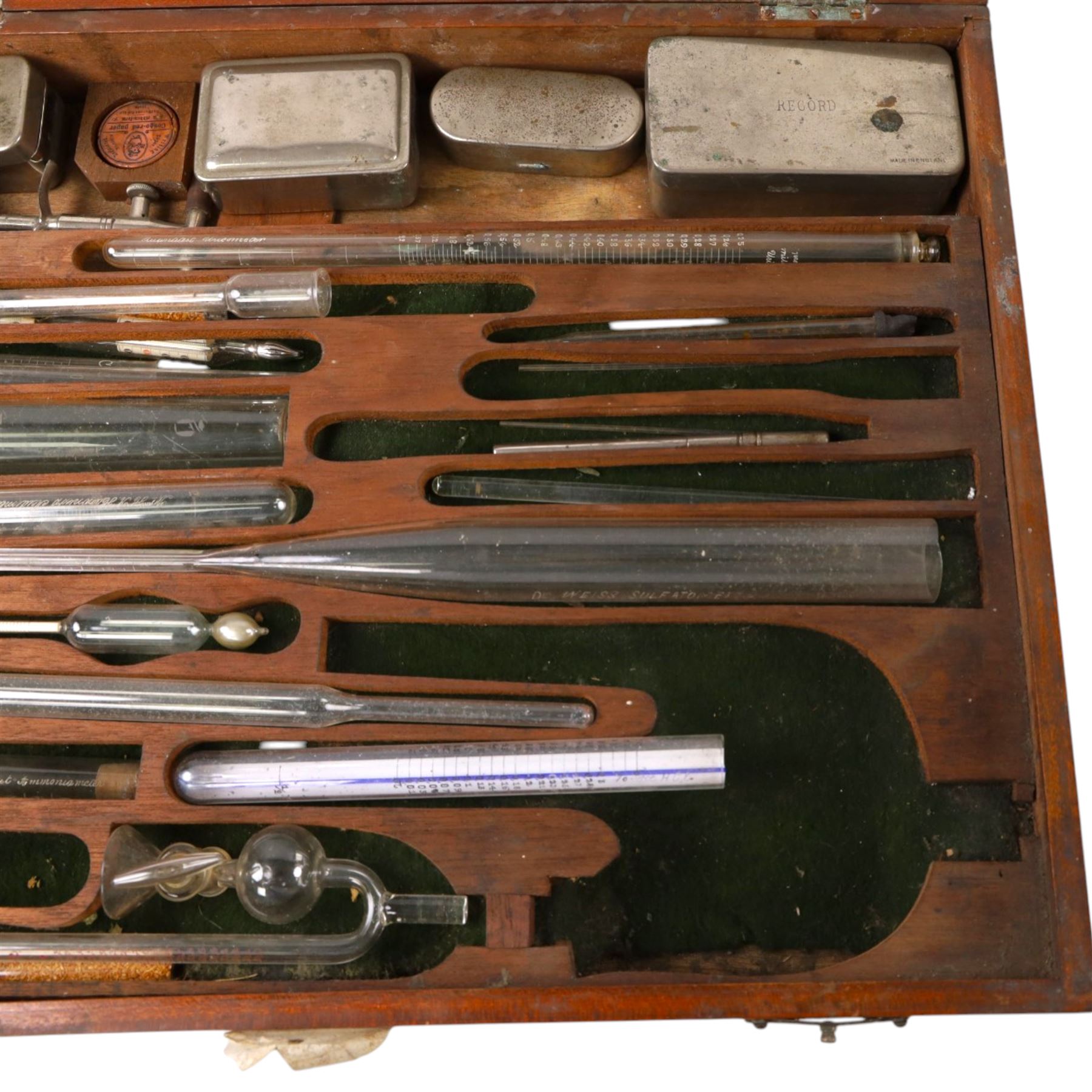 Medical instruments, including glass thermometers, unicometer, sulfatometer, ammonia meter, acidimeter for urine, albumenometer, sacchanometer, syringes etc, contained within wooden box