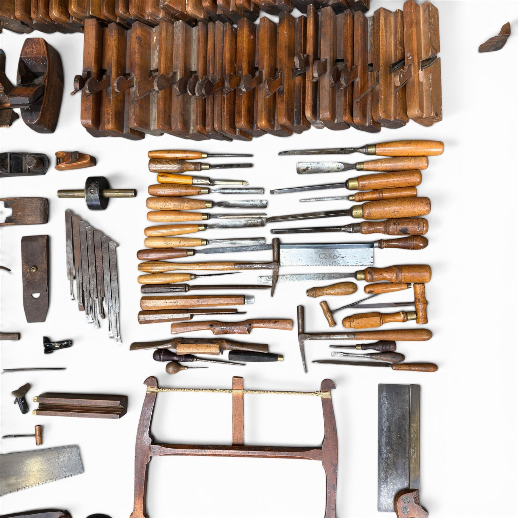 Collection of planes and woodworking tools including wood planes, chisels, hammers etc along with three books (Antique Woodworking Tools, Timber Preservation and Woodworkers Pocket Book)