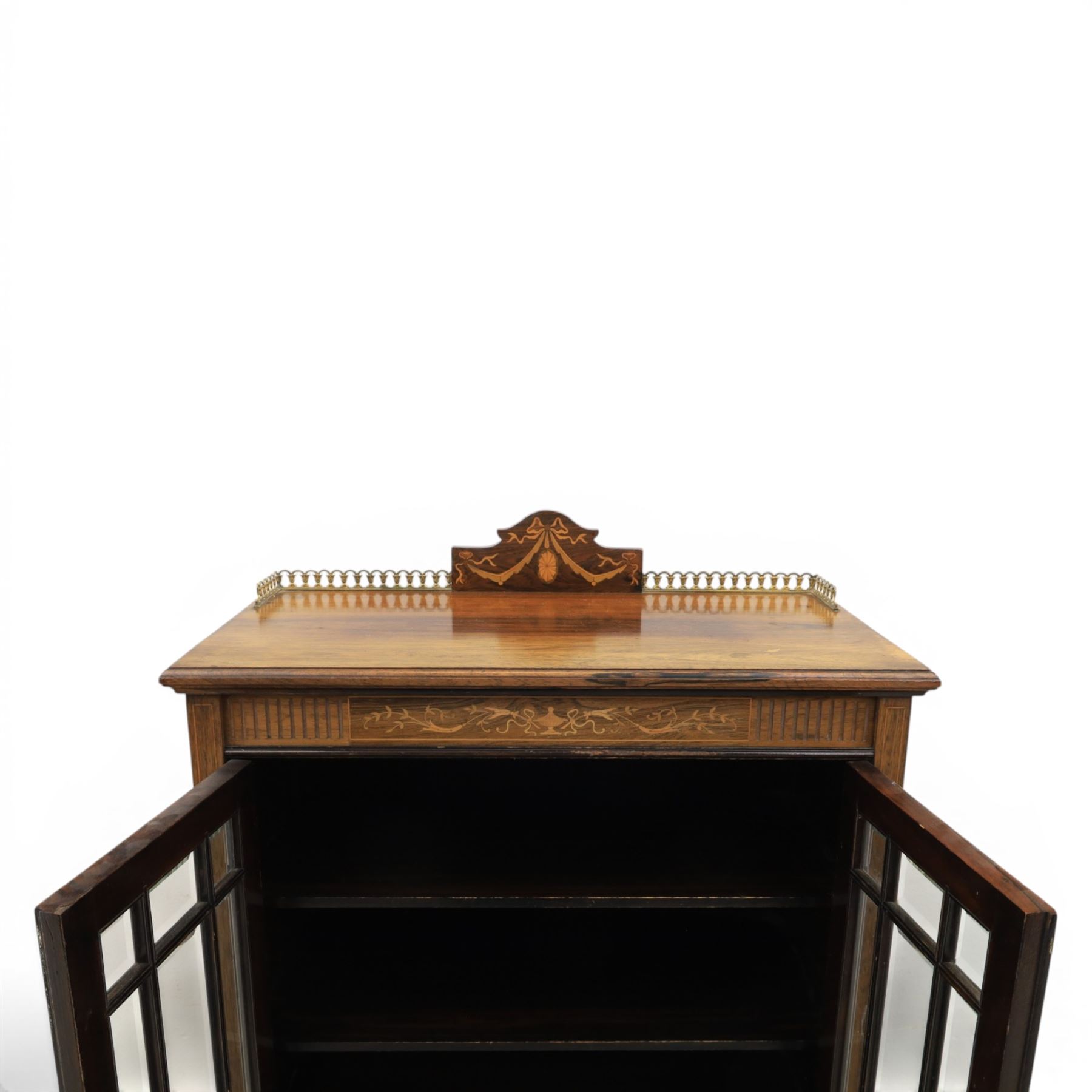 Druce & Co - Edwardian inlaid cabinet, galleried topwith inlay and brass galleried top, inlaid frieze above twin bevel glazed doors revealing a shelved interior, the lower section with fall front cupboard