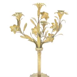 Pair of late 19th century gilt cast candelabra, each with scrolling tripartite base leading to an acanthus detailed circular pan and plain stem, supporting three arms entwined with lily flowers and leaves, the sockets also modelled as lily flowers, H60cm