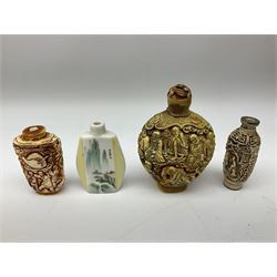 Three oriental carved bone snuff bottles, a further ceramic example, along with carved wood oriental figures, housed in hinged wood box