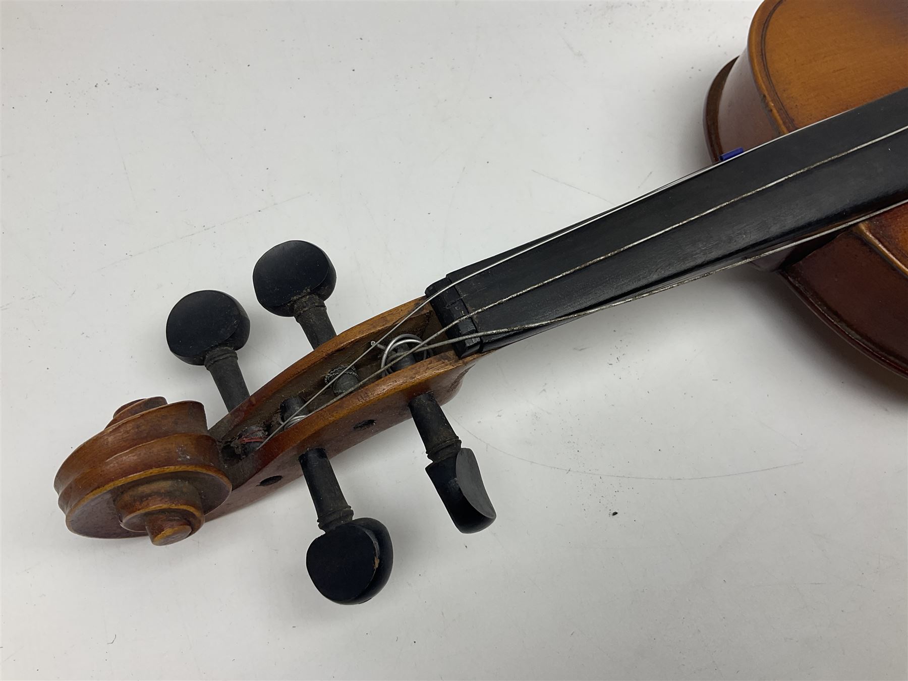 Saxony (?) violin c1950 with 36cm two-piece maple back and ribs and spruce top; bears label 'The Maidstone School Orchestra Association' L59cm overall; and 1950s Czechoslovakian violin for restoration; both in carrying cases (2)