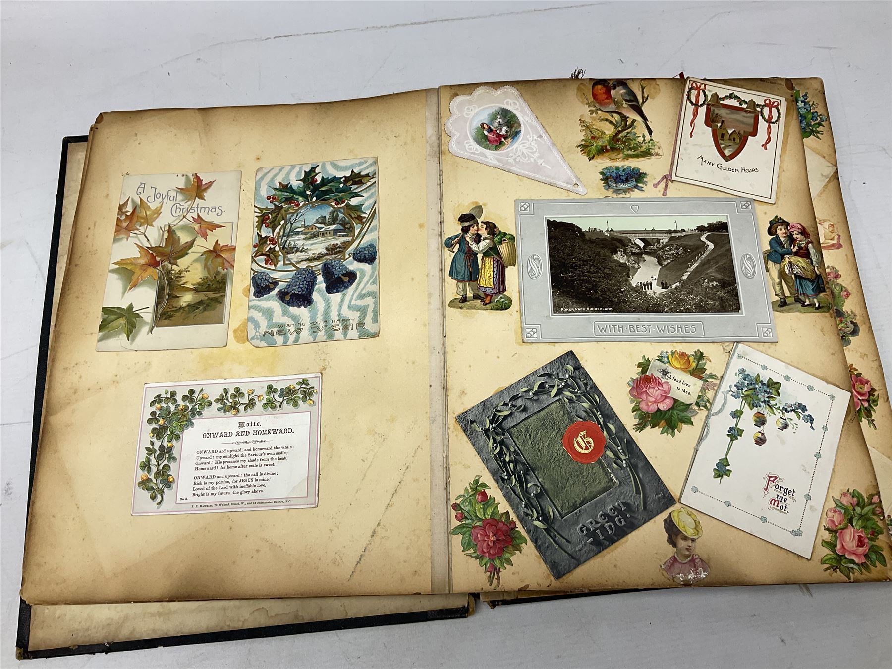 Victorian scrapbook of various fixed decoupage to include, greeting cards, portraiture, flowers, animals etc,