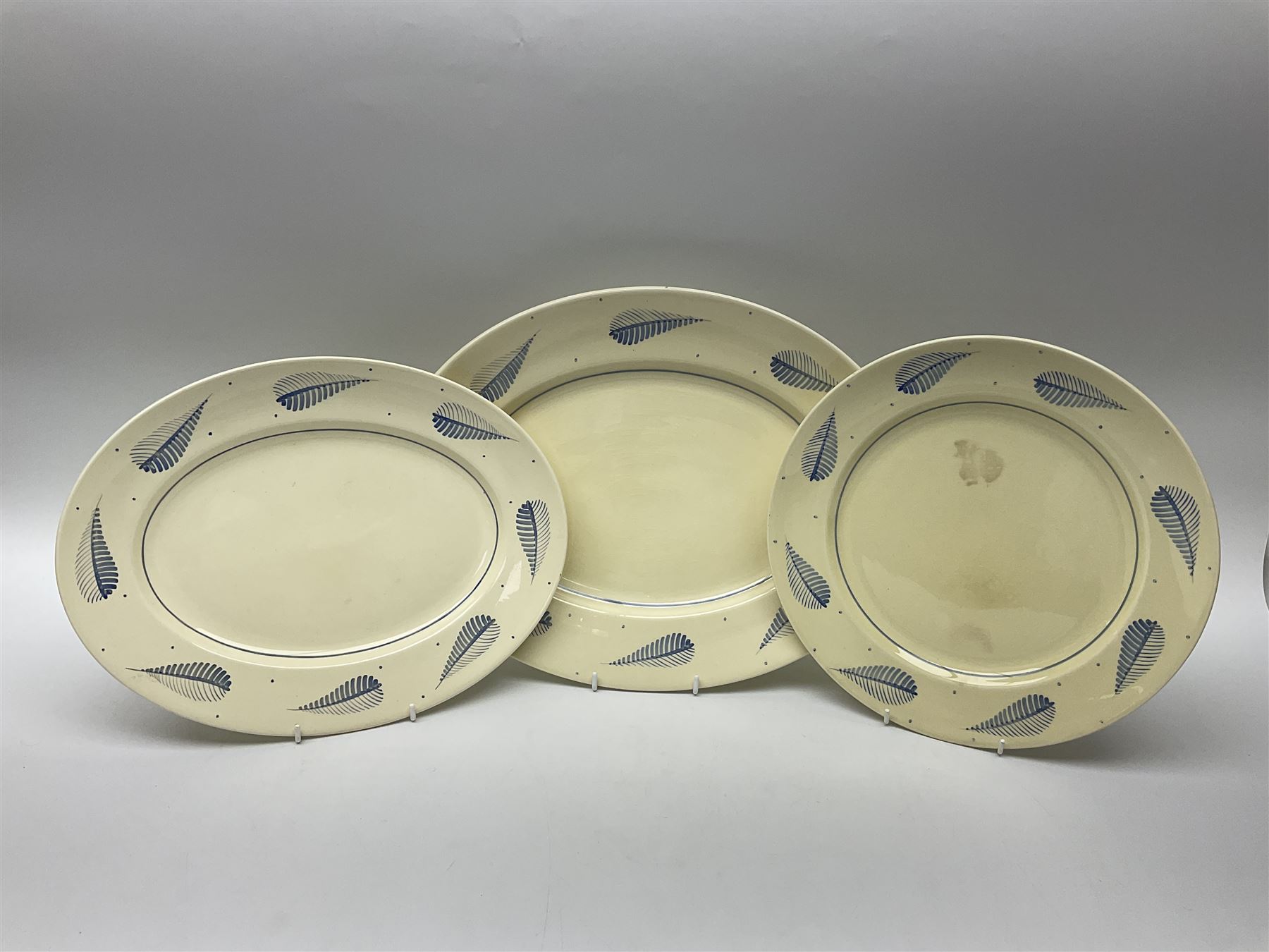 Susie Cooper Hyde Park pattern coffee set, comprising coffee pot, four coffee cans and saucers, dessert plates, together with three plates in a similar design 