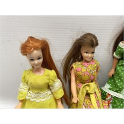 Seven Pippa dolls and a collection of plastic dolls house furniture