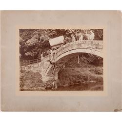 Photograph of An Incident at Beggar's Bridge - Glaisdale, showing a Horse being hauled back onto the bridge, further information verso, 15cm x 21cm (unframed)