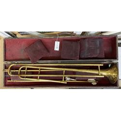 French Gaillard & Loiselet brass slide trombone in ebonised wooden carrying case with mouthpiece; and a Chinese Skylark brass slide trombone, serial no.256 in carrying case (2)