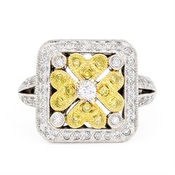 18ct white gold diamond flower head dress ring, milgrain set with sixty-five fancy yellow ...