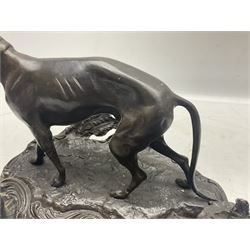 Bronze inkwell modelled in the form of a greyhound upon a naturalistic base, after Pierre-Jules Mêne, H18cm