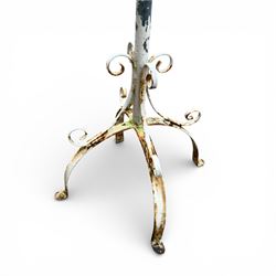 Two plant stands in a weathered white finish with wire baskets