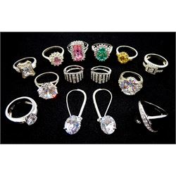 Ten silver stone set dress rings and two pairs of silver stone set earrings, all stamped 925 