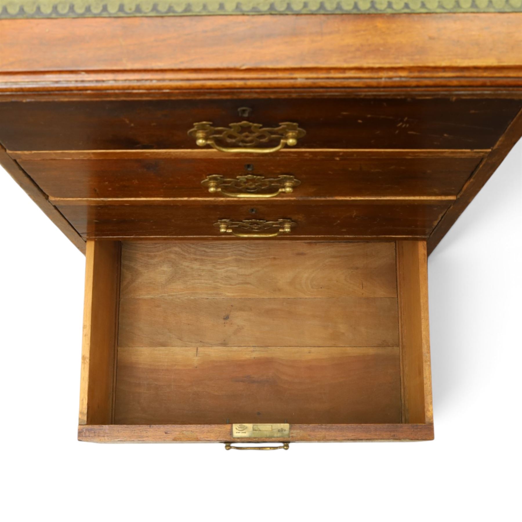 Edwardian mahogany office desk, recatangular top with green inset leather writing surface, fitted with two banks of four drawers, brass swan neck handles with ornate backplates