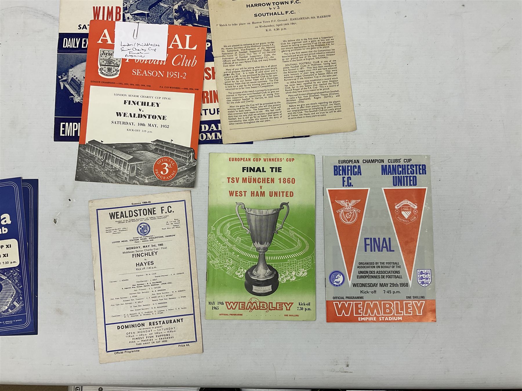 Football programmes - thirteen various England and England Youth matches 1953-77; European Cup Winners Cup Final May 19th 1965 TSV Munchen 1860 v West Ham; European Champions Club Cup Final May 29th 1968 Benfica (1) v Manchester United (4), the famous Bobby Charlton final; seven Wealdstone F.C. 1950-66 including London Senior Charity Cup Final May 10th 1952; Harrow Town Football Challenge Cup April 14th 1948; and eight F.A. Amateur Cup Finals and Semi-Finals plus three song sheets 1956-68 (34)
