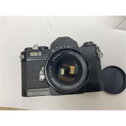 Olympus Pen-EE camera, serial no 415299, with Olympus D.Zuiko 1:3.5 f=2.8cm lens, together with four Olympus Trip 35 cameras, serial nos 4759245, 4257589, 1847727 and 5387611, each with Olympus D. Zuiko 1:28 f=40mm lenses