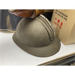 French Adrian helmet and cow horn gong stand; and quantity of lamp shades, etc, helmet H47cm