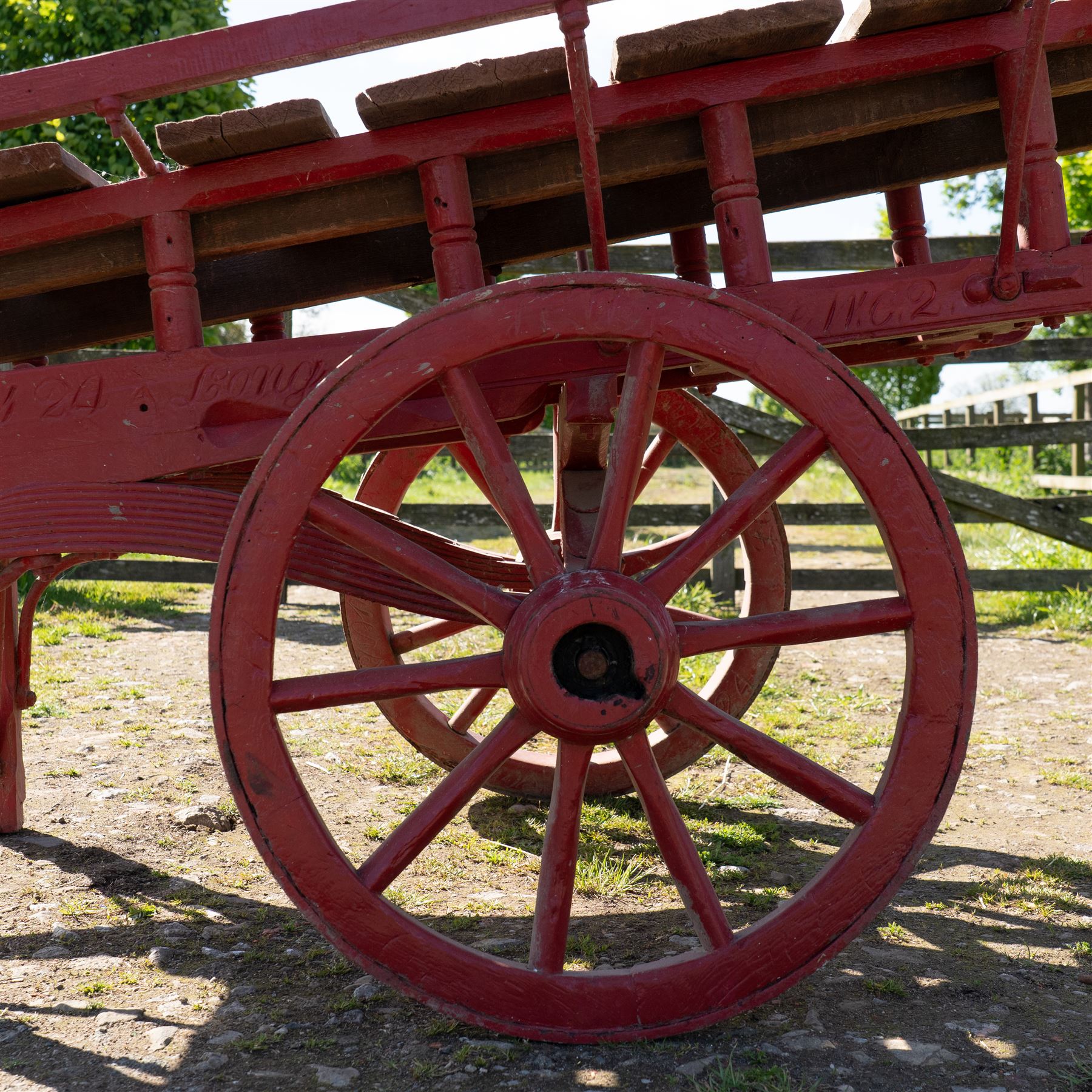 Costermonger’s Cart

A painted costermonger’s cart with red timber frame, slatted deck and wooden spoked wheels. The cart has long hand rails, raised side rails and turned supports, with incised inscriptions to the frame, including “Meyers Bros”. The form is consistent with a hand drawn market cart, used for carrying and displaying produce or goods.

Features:
Red painted timber frame
Slatted wooden deck
Wooden spoked wheels
Long hand rails
Raised side rails
Turned timber supports
Incised inscriptions to the frame
“Meyers Bros” inscription visible
Traditional market cart form

Dimensions:
Length: 240 cm (body approximately 210 cm)
Width: 102 cm
Height: 92 cm

Wheel diameter: 67 cm