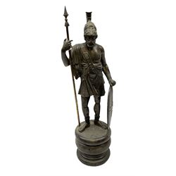 Spelter figure of a Roman soldier, raised upon circular base, with shield and spear, H40cm
