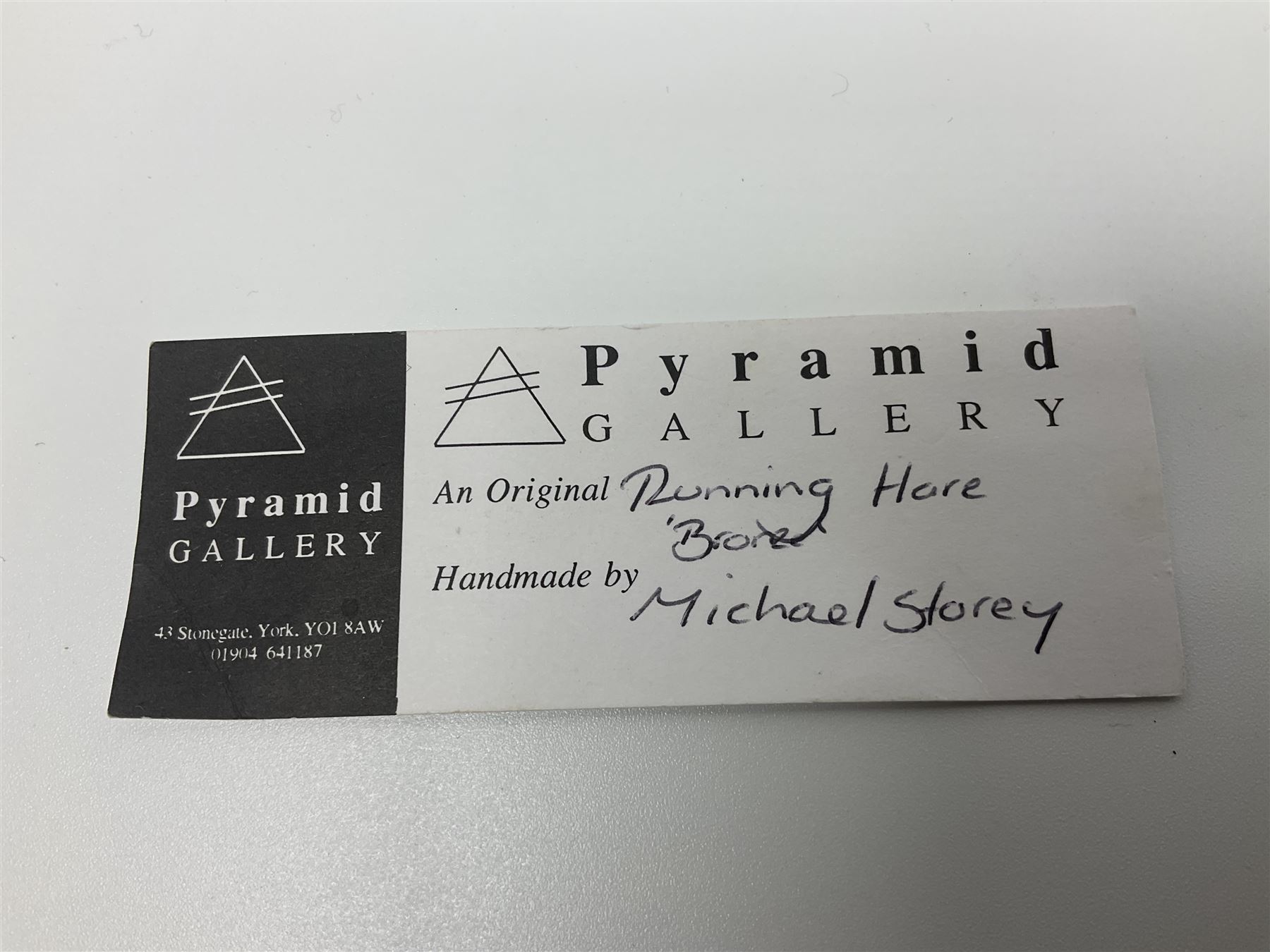 Michael Storey (British 1948-): 'Running Hare', bronze of a hare, H7cm, L10cm 