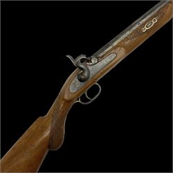 20th century Indian percussion musket, the 81cm octagonal barrel with under rib and ramrod, brass fittings including front and rear swivels, oak half stock with cheek piece and chequered pistol grip stamped 1589 L124.5cm overall