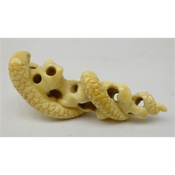  Japanese Meiji ivory Okimono carved has a Snake coiled around rock work, L6.5cm Provenance: private collection   
