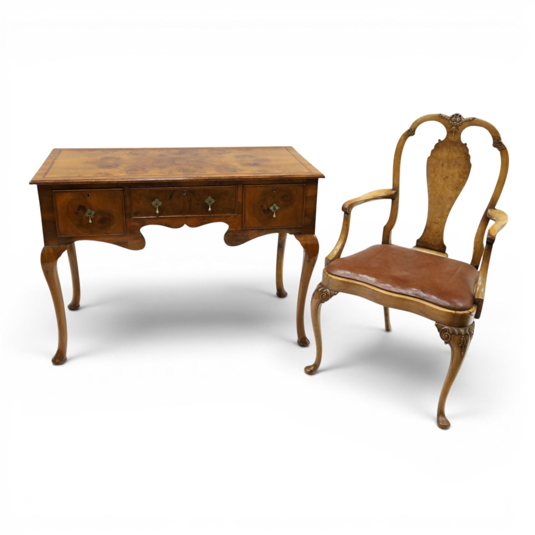 Queen Anne Design walnut kneehole desk with matching chair, rectangular figured top with crossbanding, three frieze drawers, raised on cabriole supports, the chair with serpentine front raised on cabriole supports