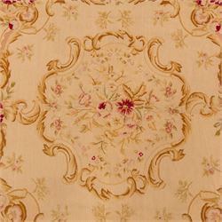 20th-century Aubusson-style tapestry wall hanging of square form, woven with a central floral medallion composed of delicate sprays in soft pinks, creams, and muted greens, framed by scrolling acanthus ornamentation and floral cartouches to each corner, all set within a pale ivory ground and enclosed by a terracotta toned border 