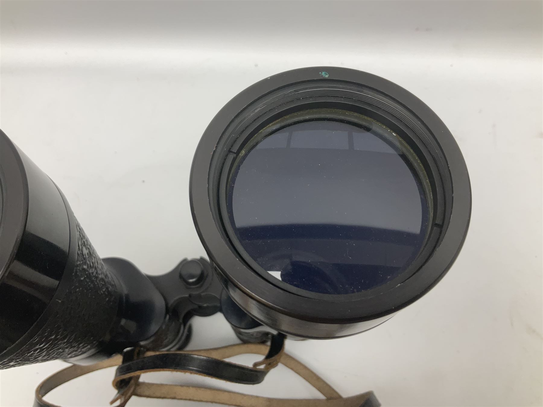 Ten cased pairs of binoculars, to include Ross London Steplux 7x50, Ross Solaross 16x60, Crescent zoom 7x- 12x50, Hilkinson 20x60,  Ross Stepnada 7x30,  Philo 10x50 etc