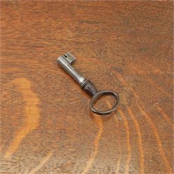 Late 19th century French provincial oak chest of drawers, moulded rectangular top with carved rope edge over four graduated long drawers with raised and fielded panels and ornate cast handles, canted angles and shaped apron below, standing on moulded block feet,