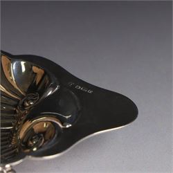 Edwardian silver clam shell butter dish, upon three bun feet, hallmarked James Deakin & Sons, Sheffield 1910