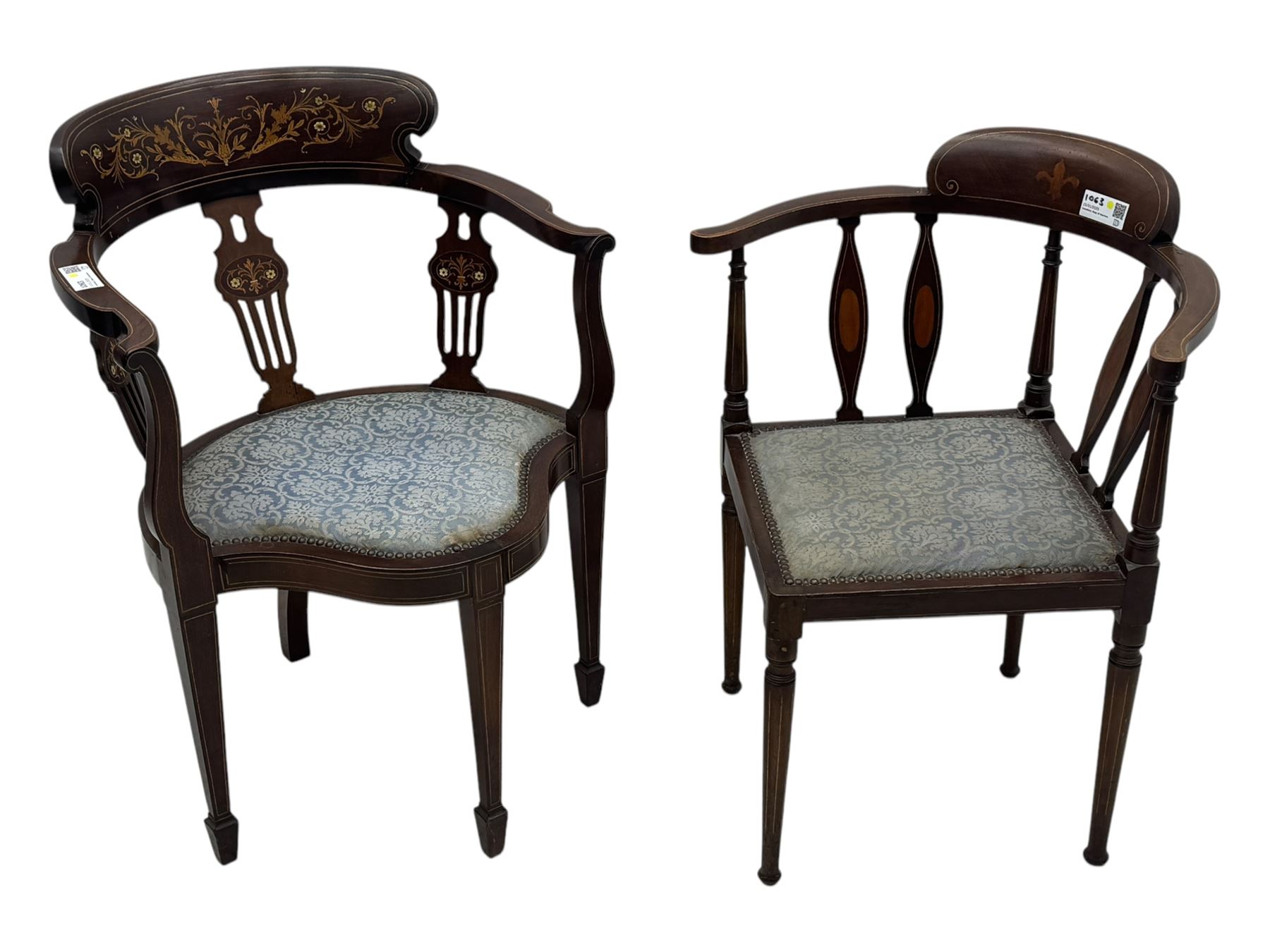 Edwardian inlaid mahogany corner chair, curved arms on shaped splat supports inlaid with satinwood, on turned supports (W60cm, H75cm); Edwardian inlaid mahogany tub-shaped armchair, the cresting rail inlaid with scrolling acanthus leaves and flower heads, on square tapering supports with spade feet (W58cm, H80cm)