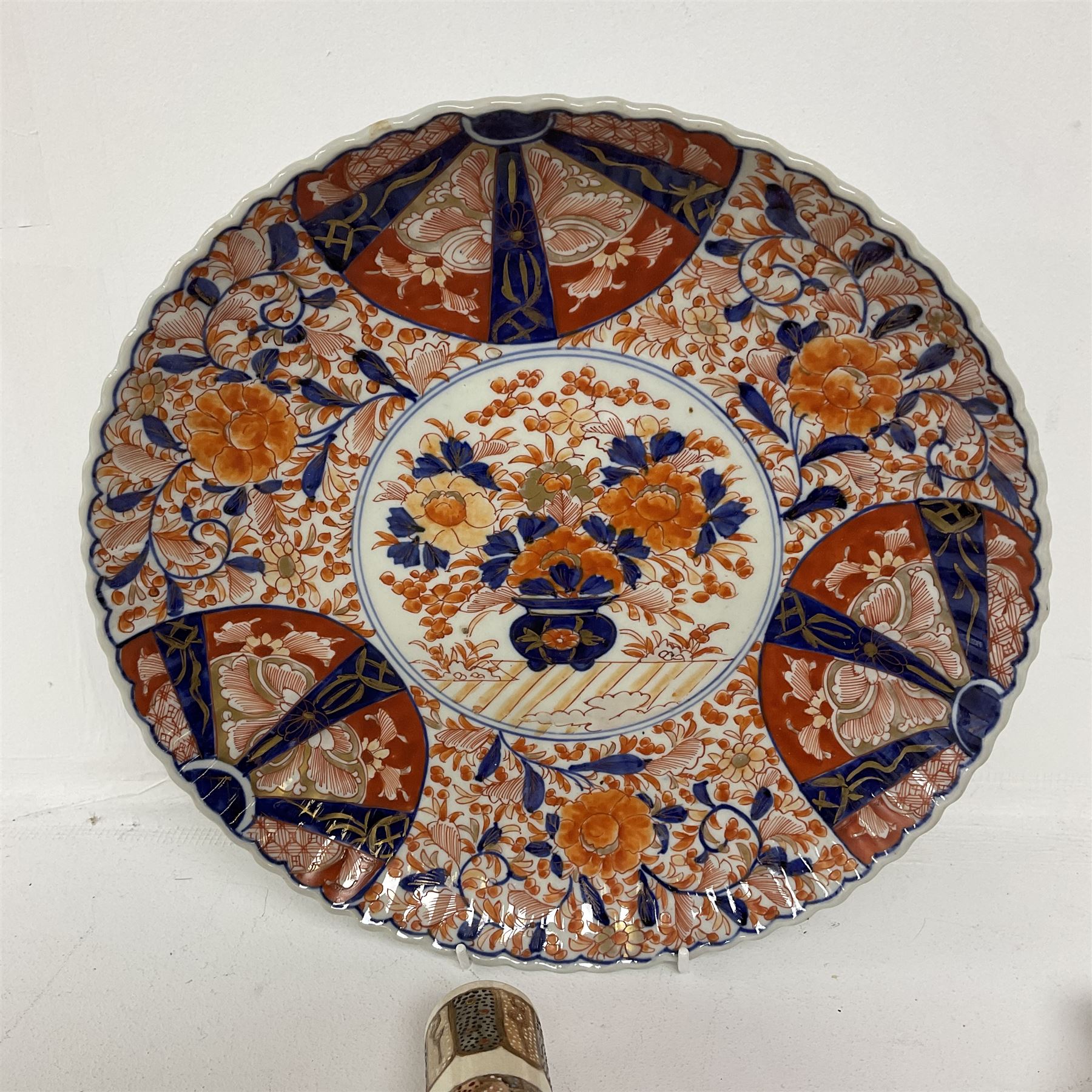 Collection of Japanese ceramics comprising pair of Satsuma vases decorated with panels depicting children and samurai figures, together with a Kutani vase painted with birds and flowers, all with painted character marks beneath, and an Imari plate, largest vase H31cm