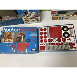 Fischer Technik/Lego/Playmobil - thirteen model building sets comprising eight Fischer Technik sets 50, 50/1, 50v, 50/2, 50+mot1 and two 50S, 50/1 add-on pack, with spare parts packs 01, 03, 05, two 22 and 30; two Lego sets comprising C107 and Lego Systems 103, part-set 870 and 970; Playmobil no.3520 set; four boxes of loose lego, various instruction manuals and a scrapbook 