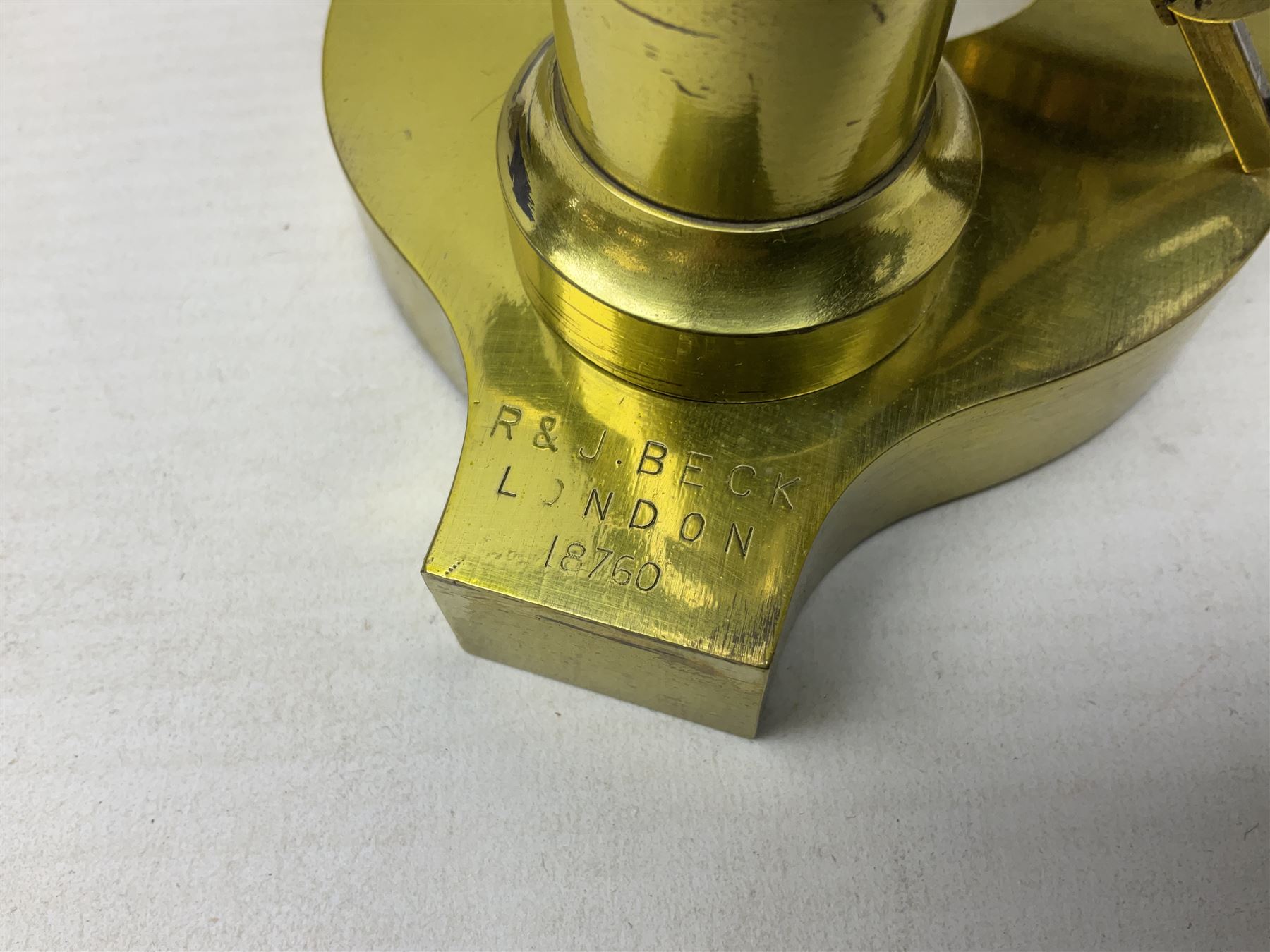 19th century brass monocular microscope by R. & J. Beck London No.18760 with hinged column and pitchfork base H25cm; in fitted mahogany case with two lenses