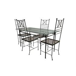 Wrought metal garden or conservatory dining table, rectangular glass top; and four wrought metal chairs, ladder back with lattice seat