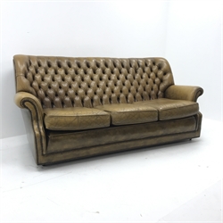 Pegasus three seat sofa upholstered in deeply buttoned antique brown leather, W185cm